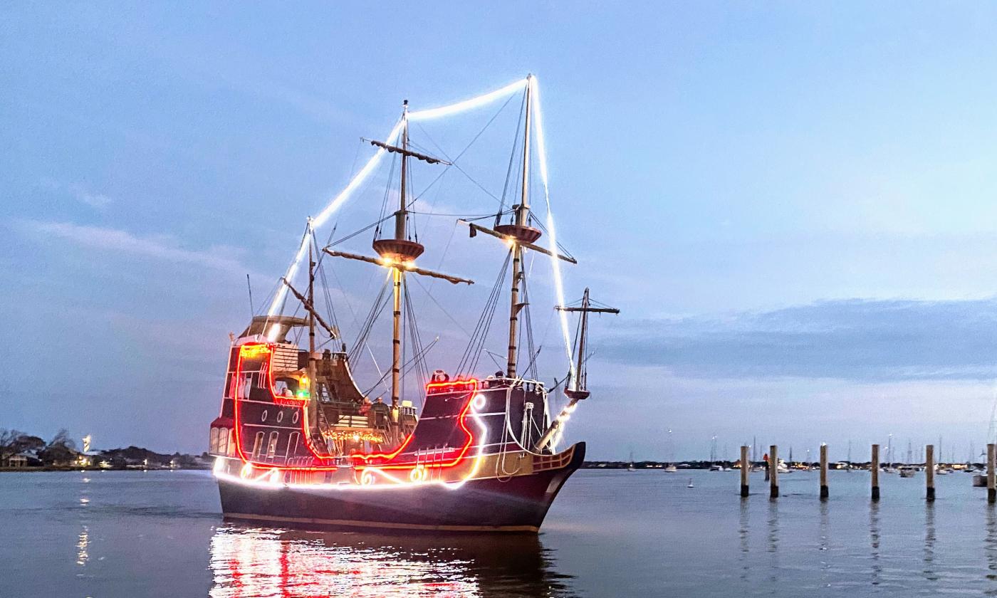 The Black Raven Pirate Ship at dusk. Lit like a pirate sleigh for Nights of Lights