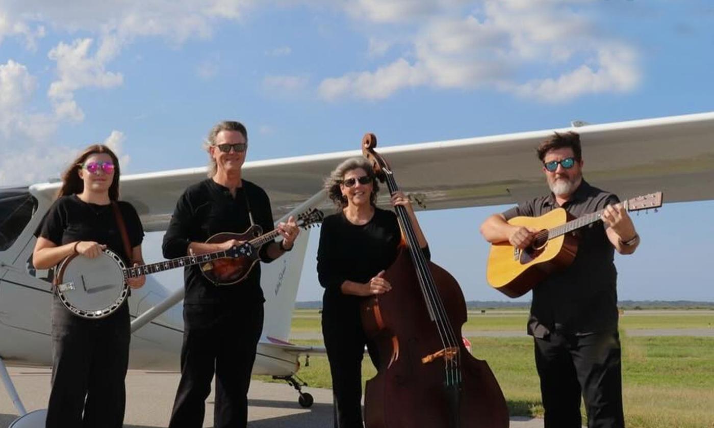The North Florida Taildraggers with instruments, outside at air field
