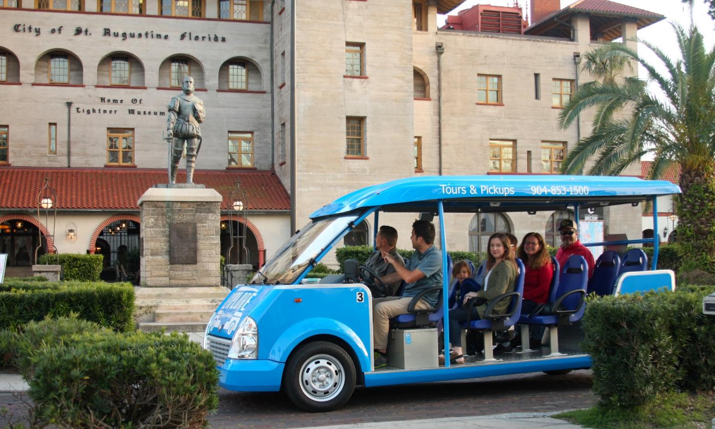 A group on a historical tour by the Lightner Museum
