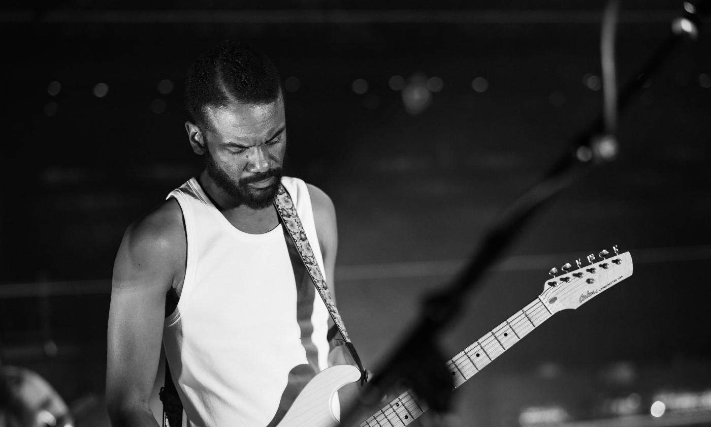 Gary Clark Jr on stage with his guitar