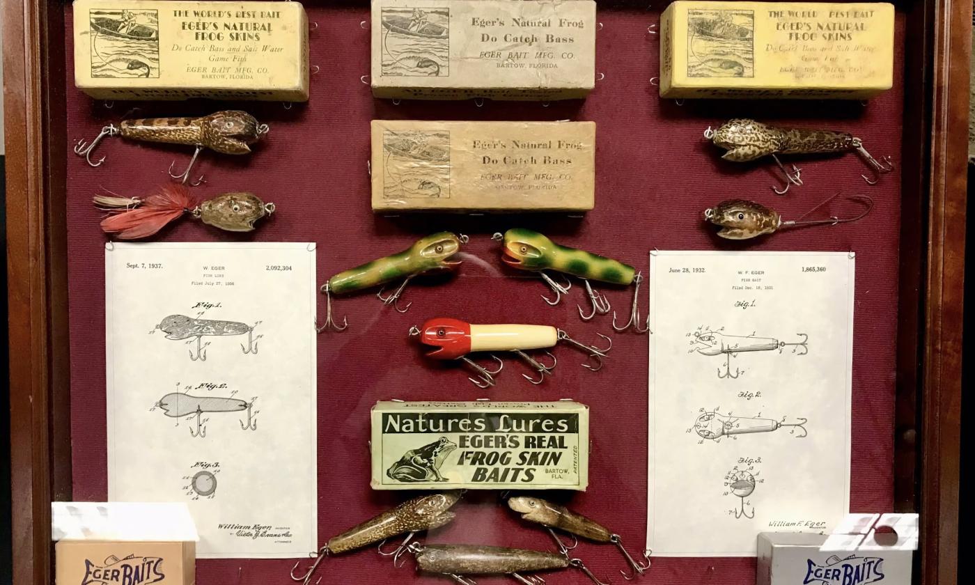 Fishing and tackle memorabilia in a shadow box