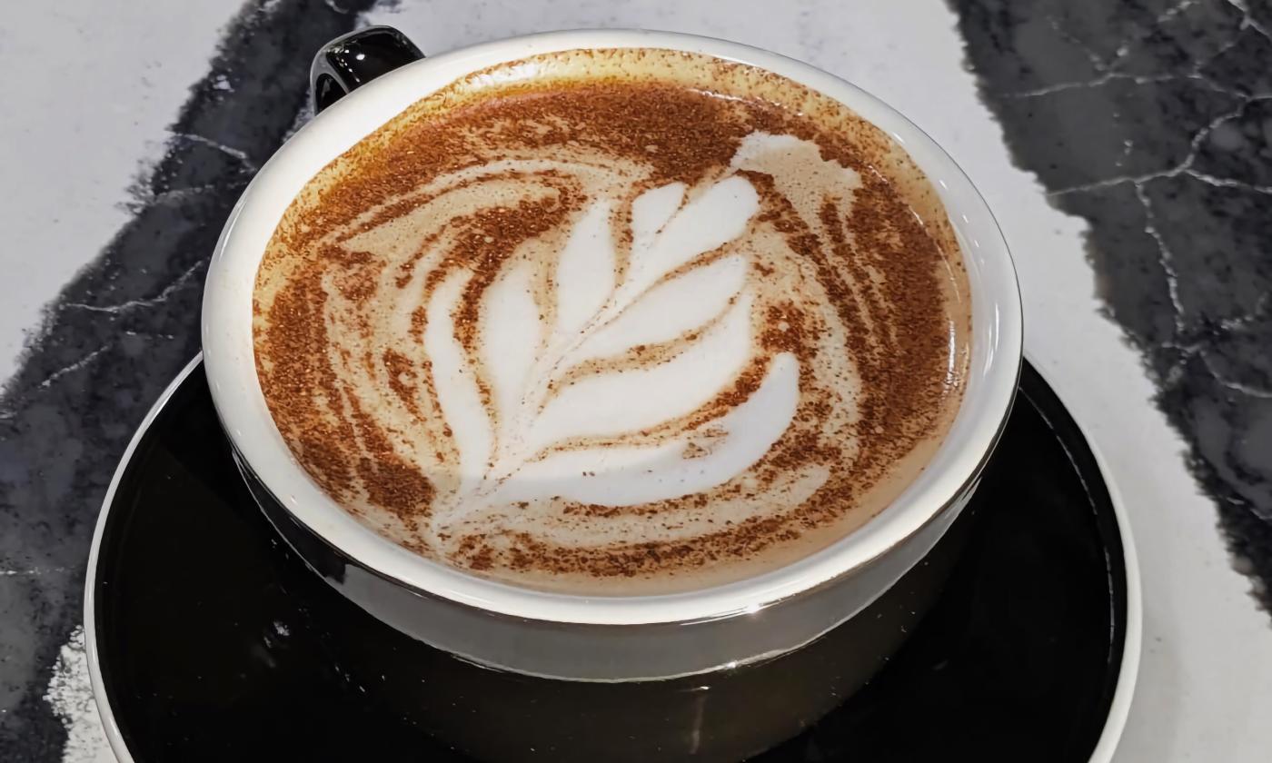 A design on a hot latte