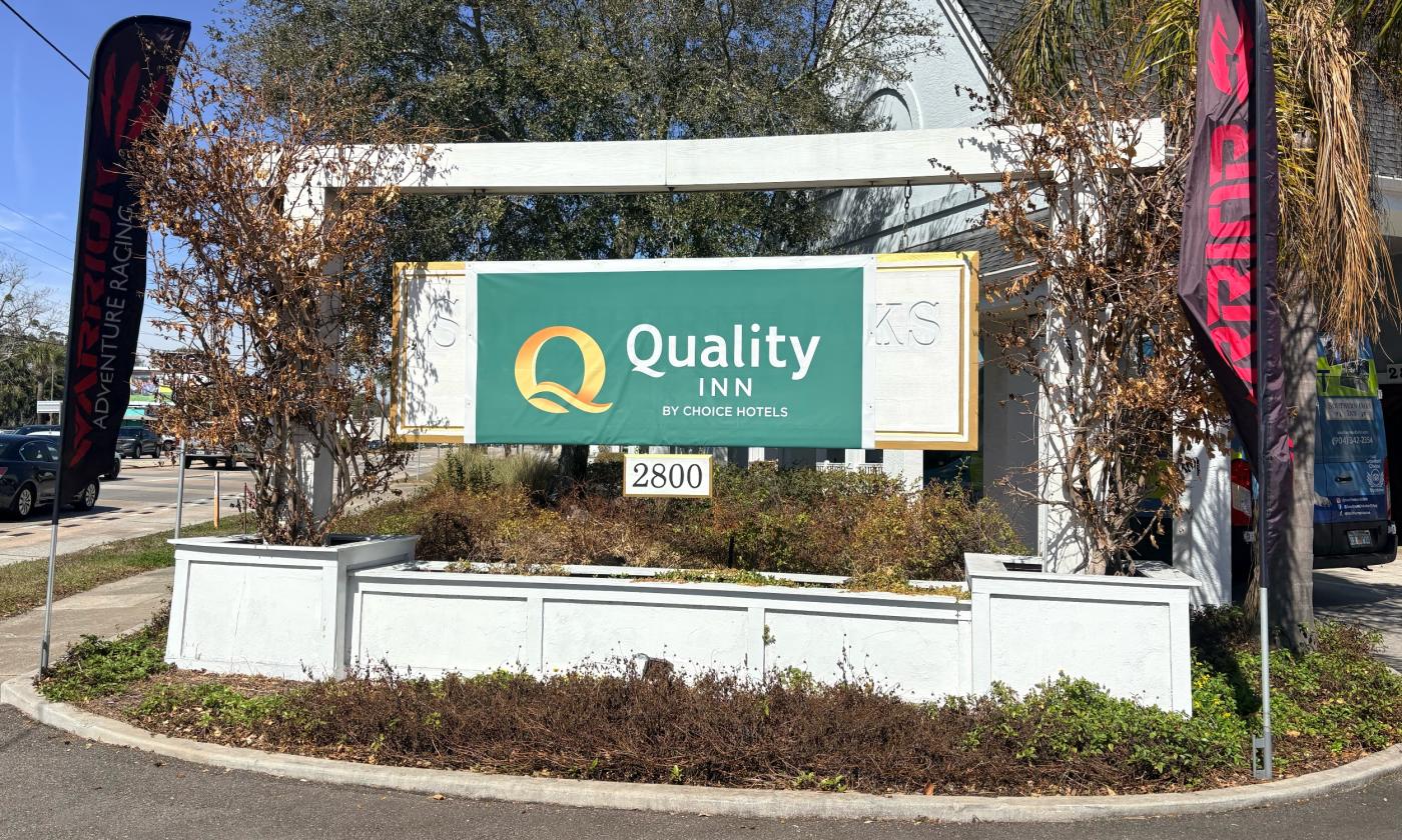 The sign for the Quality Inn Historic Downtown