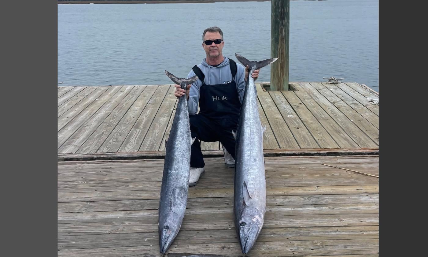 An angler showing the wahoo he caught during the 2025 Round-up