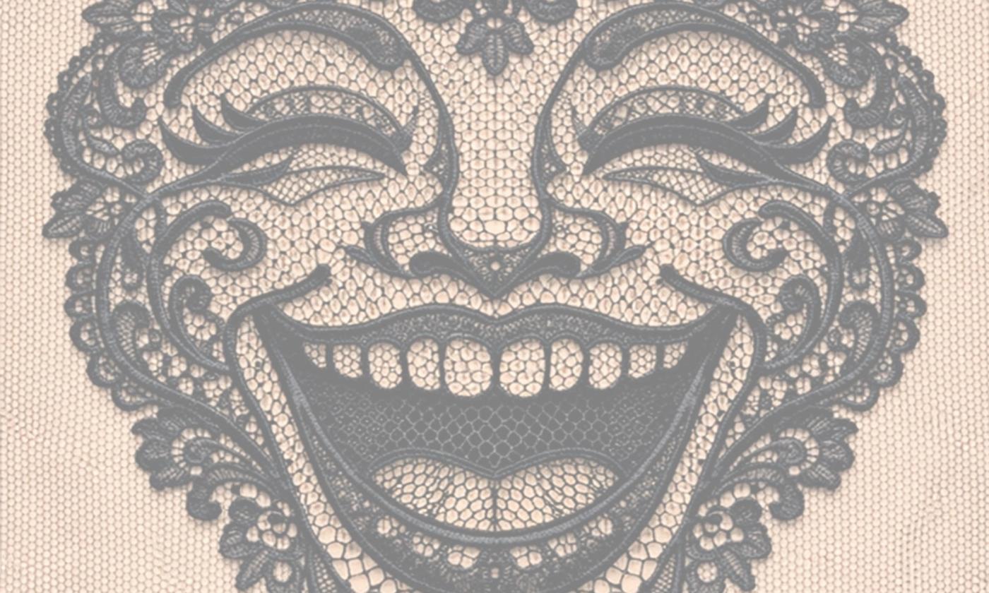 a woman's face made out of lace that's laughing
