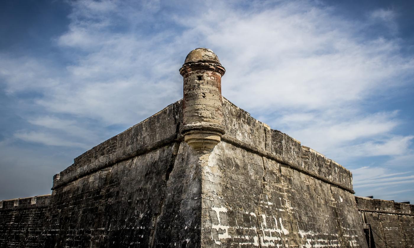 The Castillo de San Marcos under a blue sky with whispy clouds