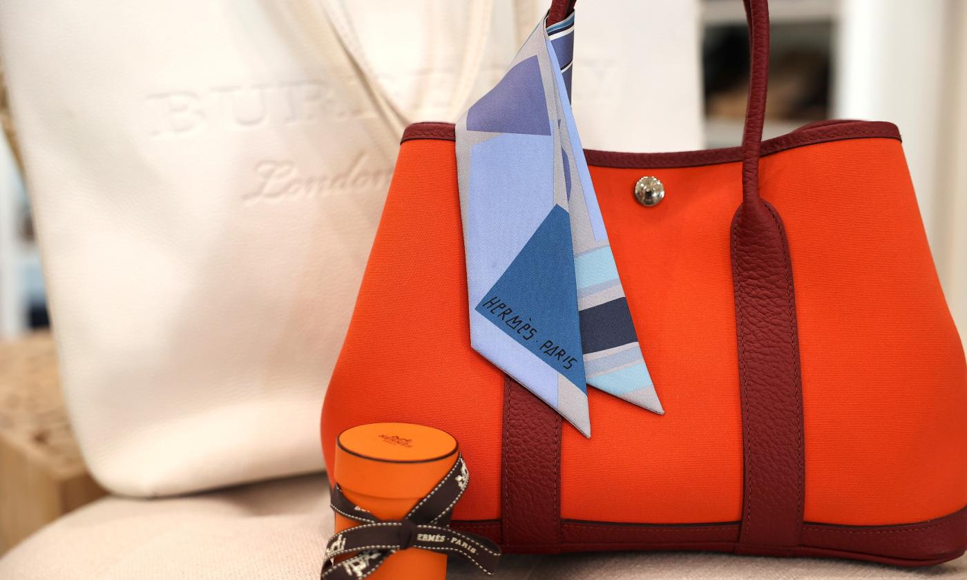 A designer bag with an accessory