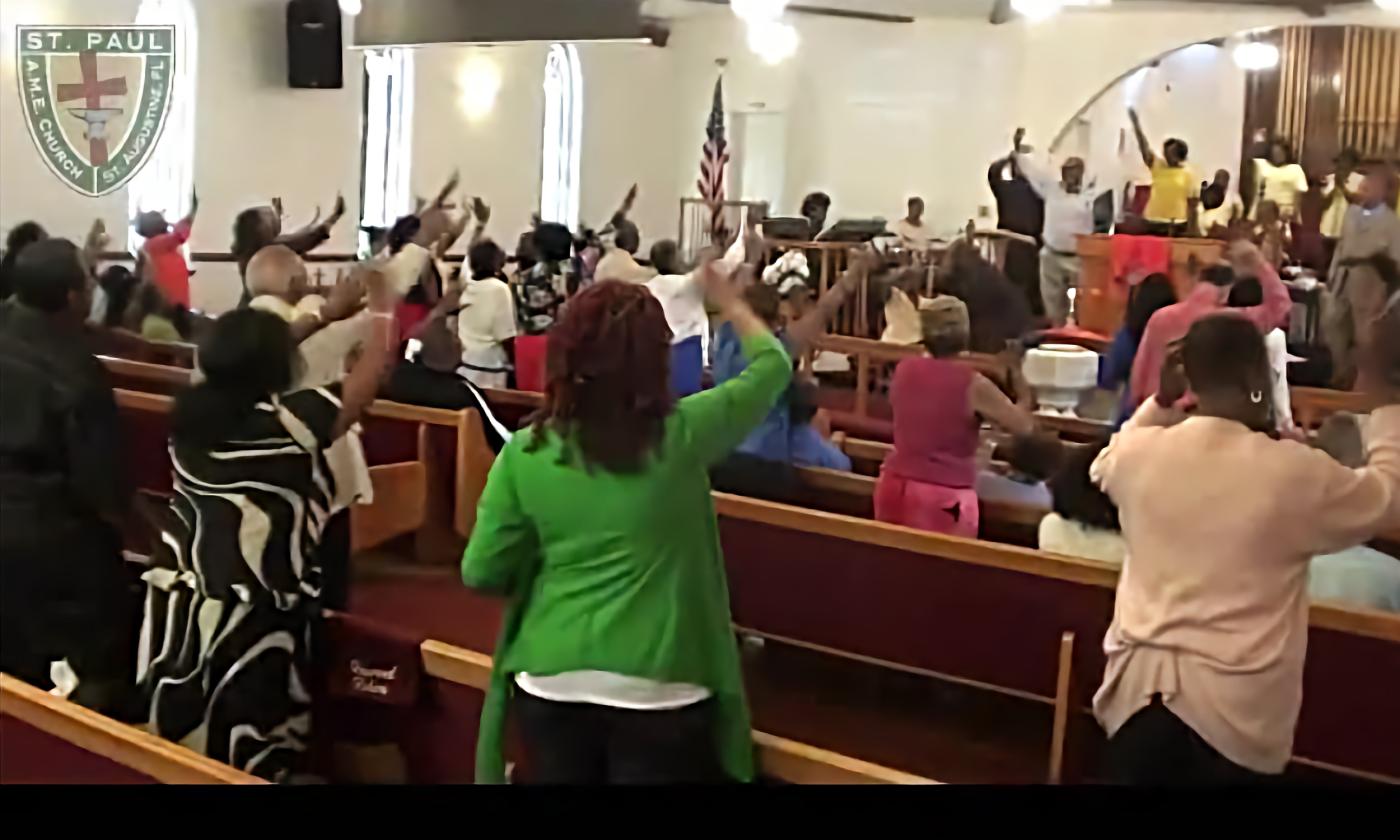 Congregants at St. Paul AME Church singing