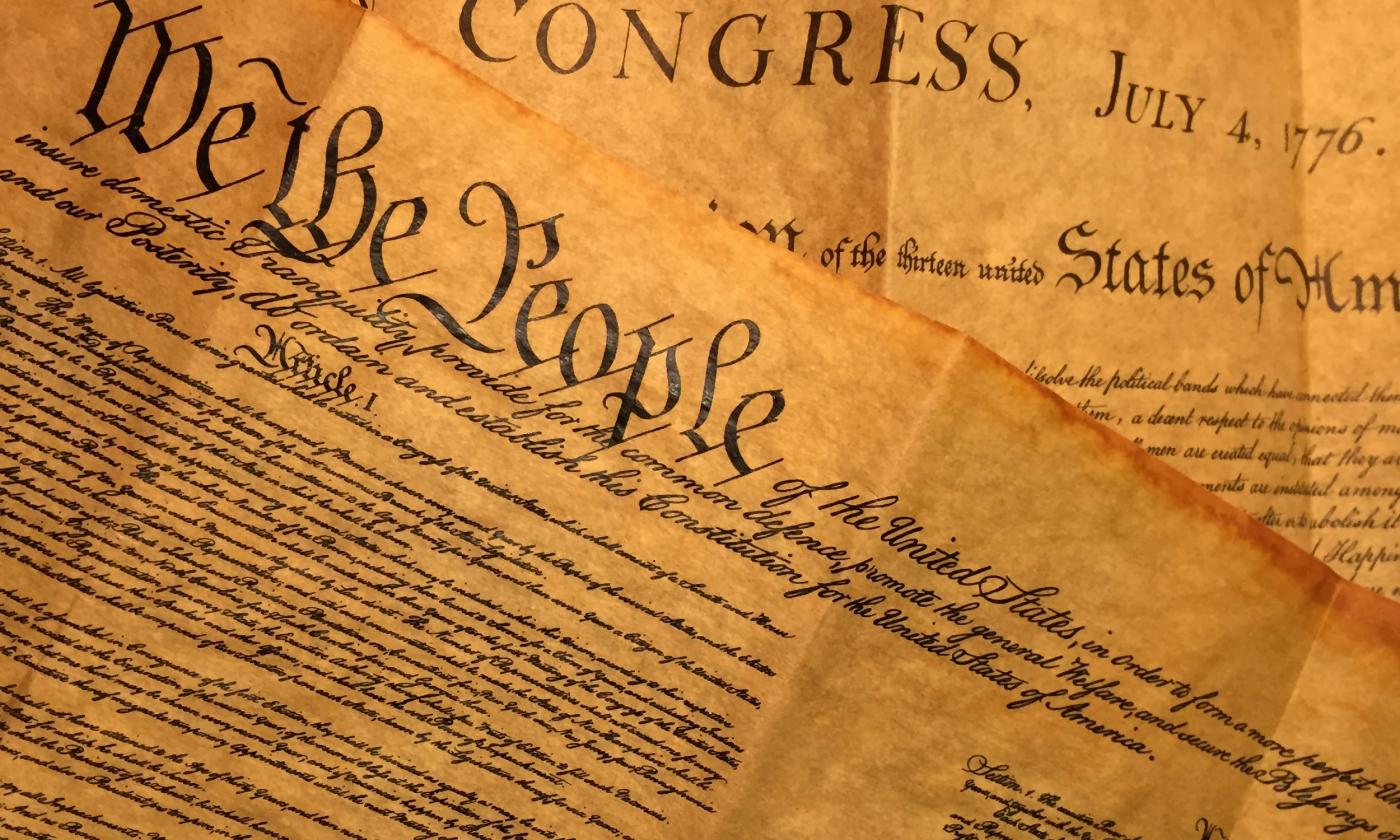 Two copies of the Declaration of Independence stacked askew