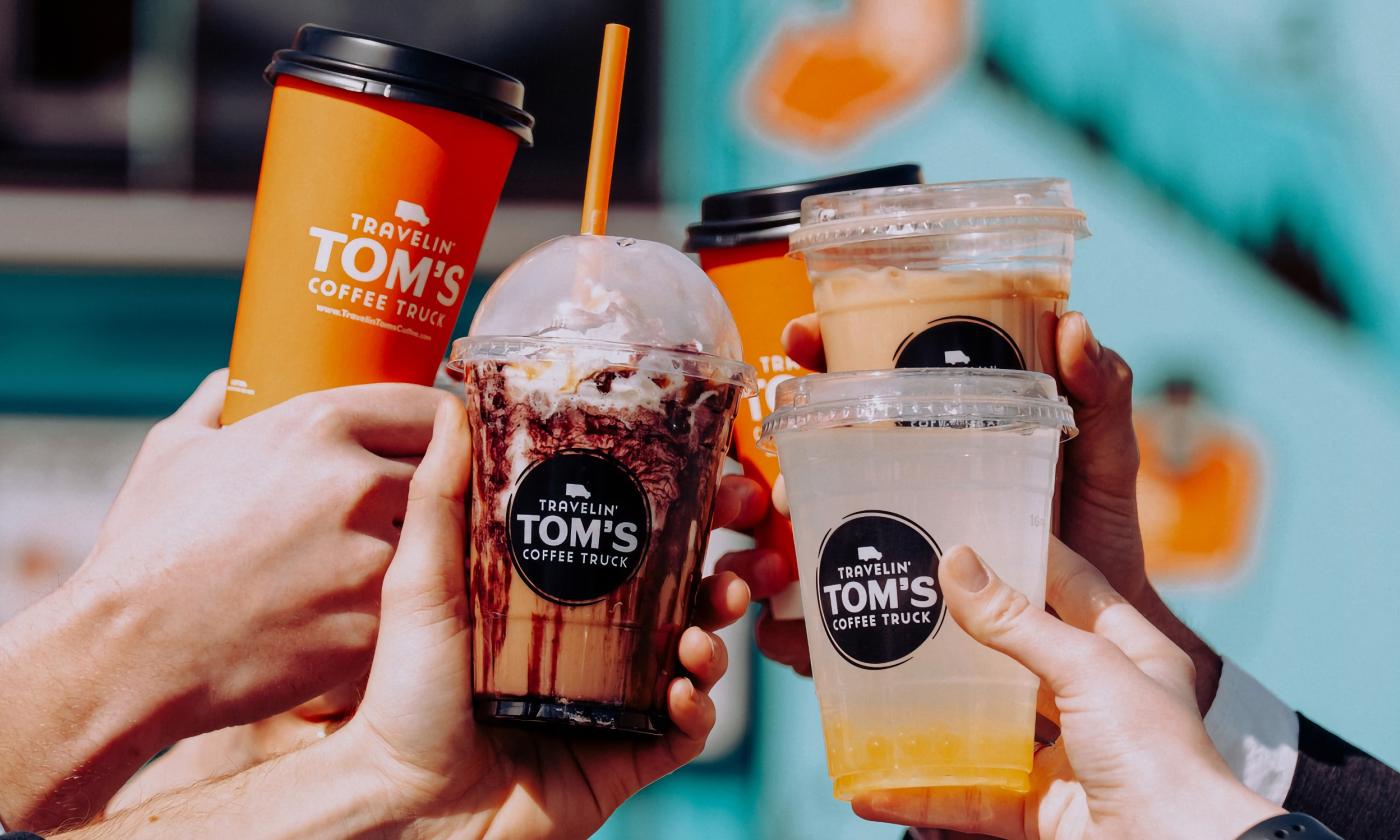 An assortment of drinks held up