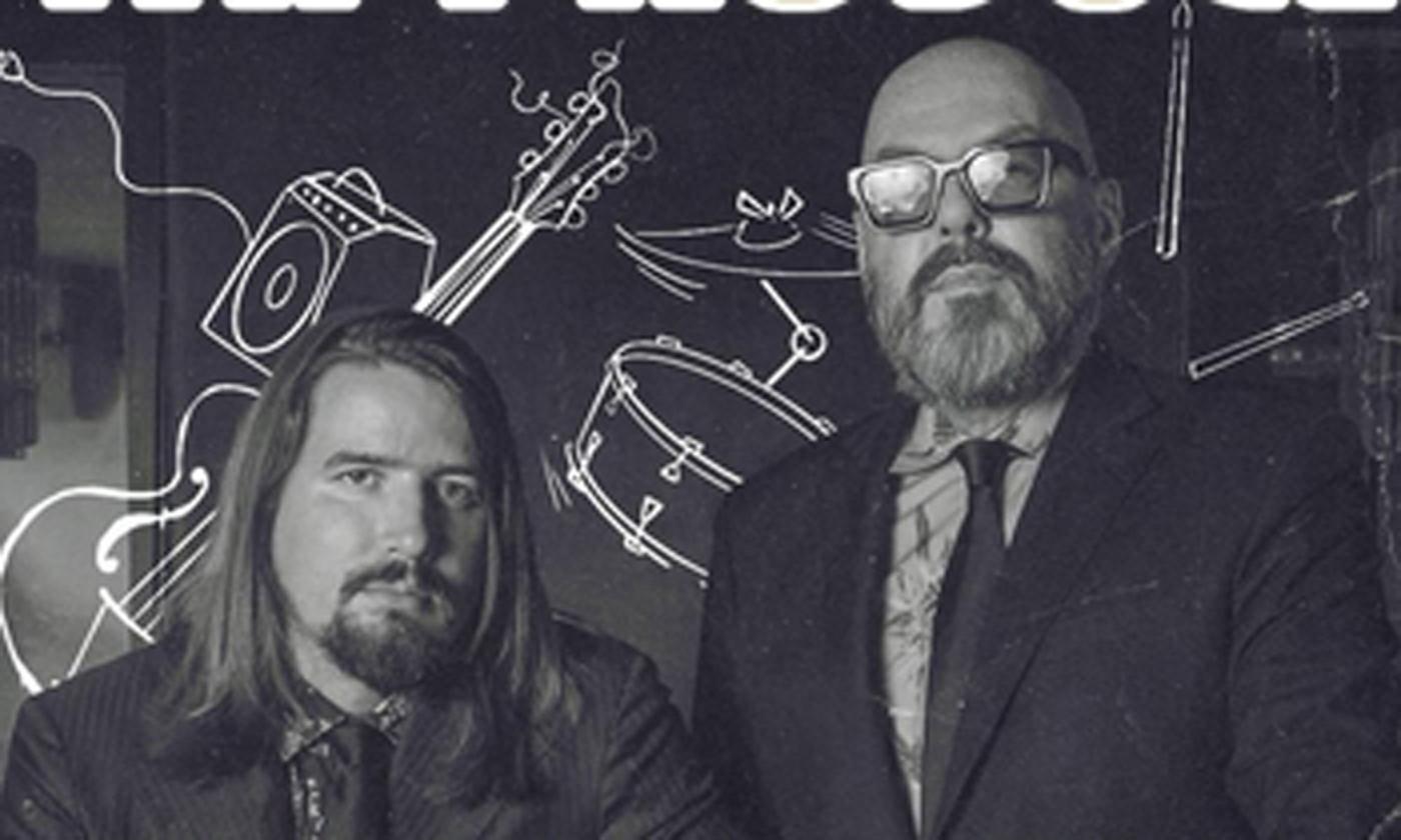 Jazz sould duo Fat Produce standing together on stage. 