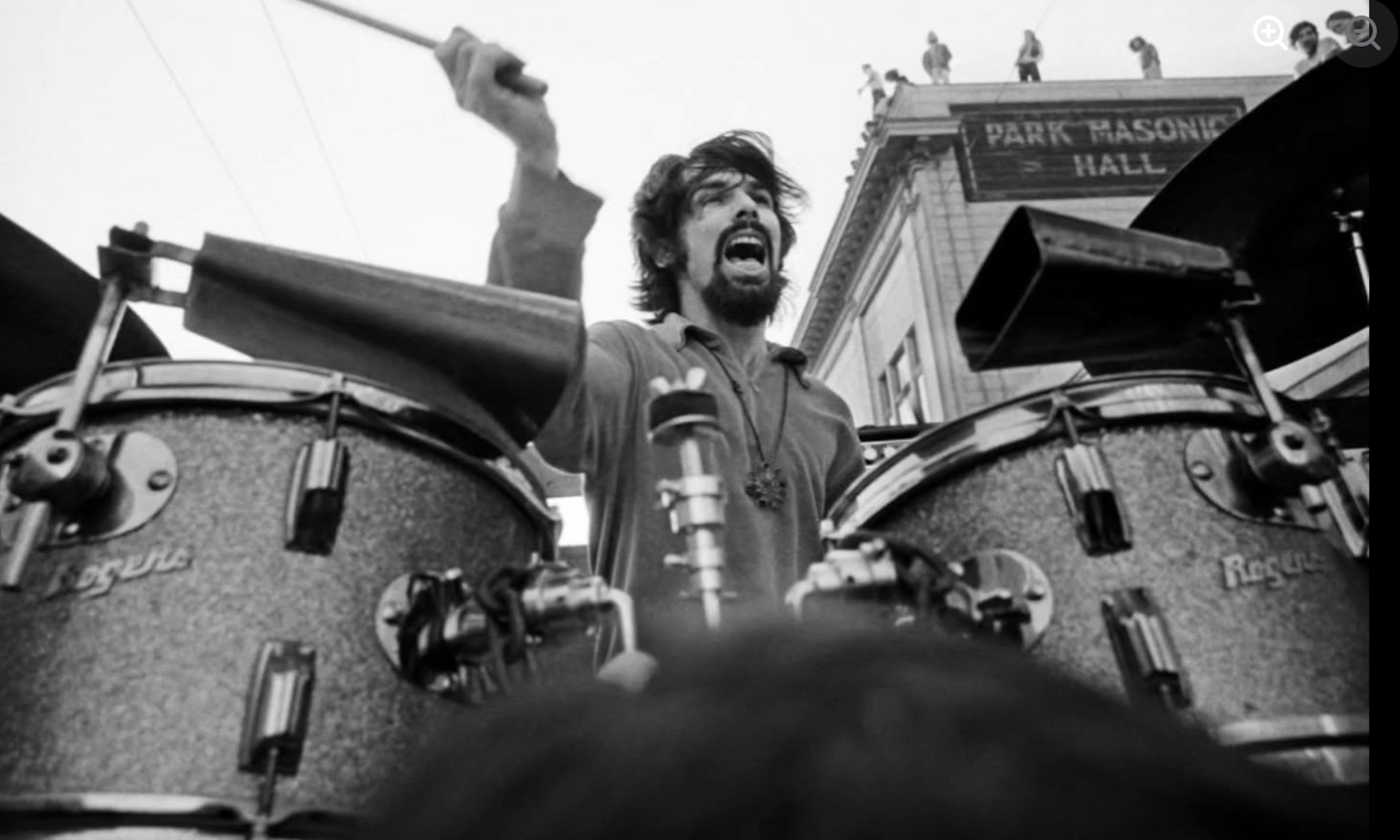 The drummer from Shakedown Citi performs in front of an audience.