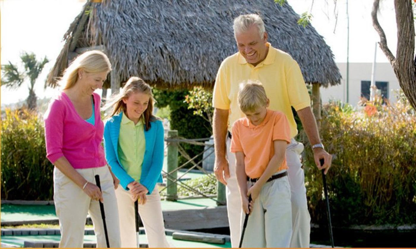 Families love the miniature golf course at Adventure Landing.