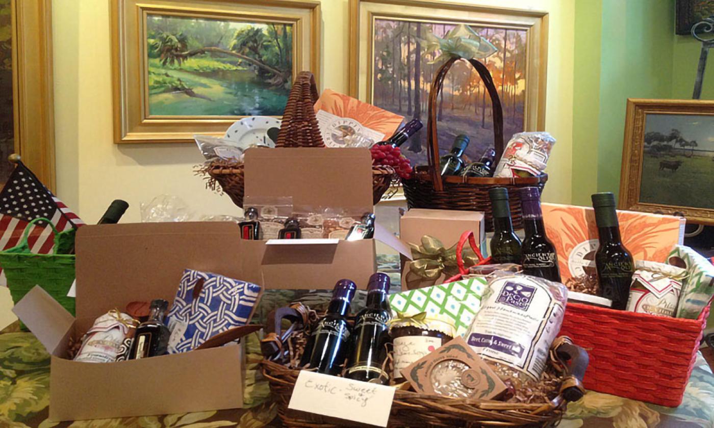 Craft olive oils, vinegars, and other pantry items packed in baskets