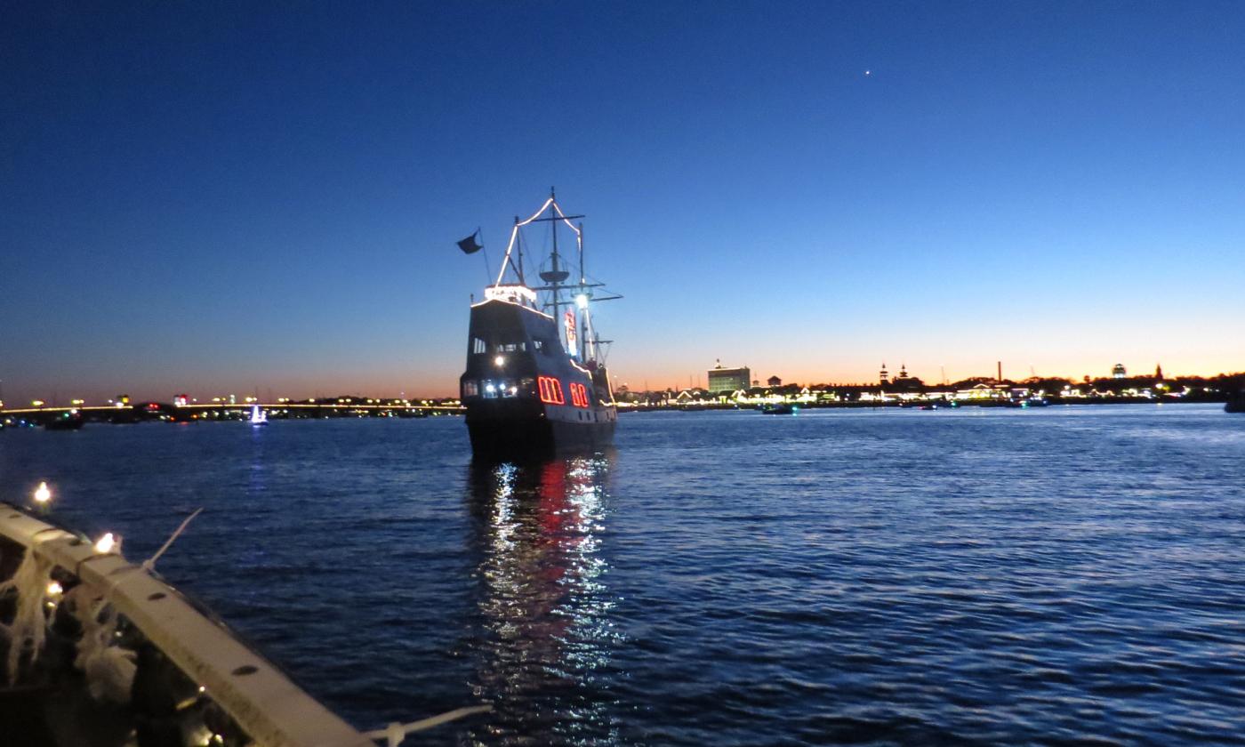 Black Raven Pirate Ship at dusk, lit for the Regatta of Lights in St. Augustine.