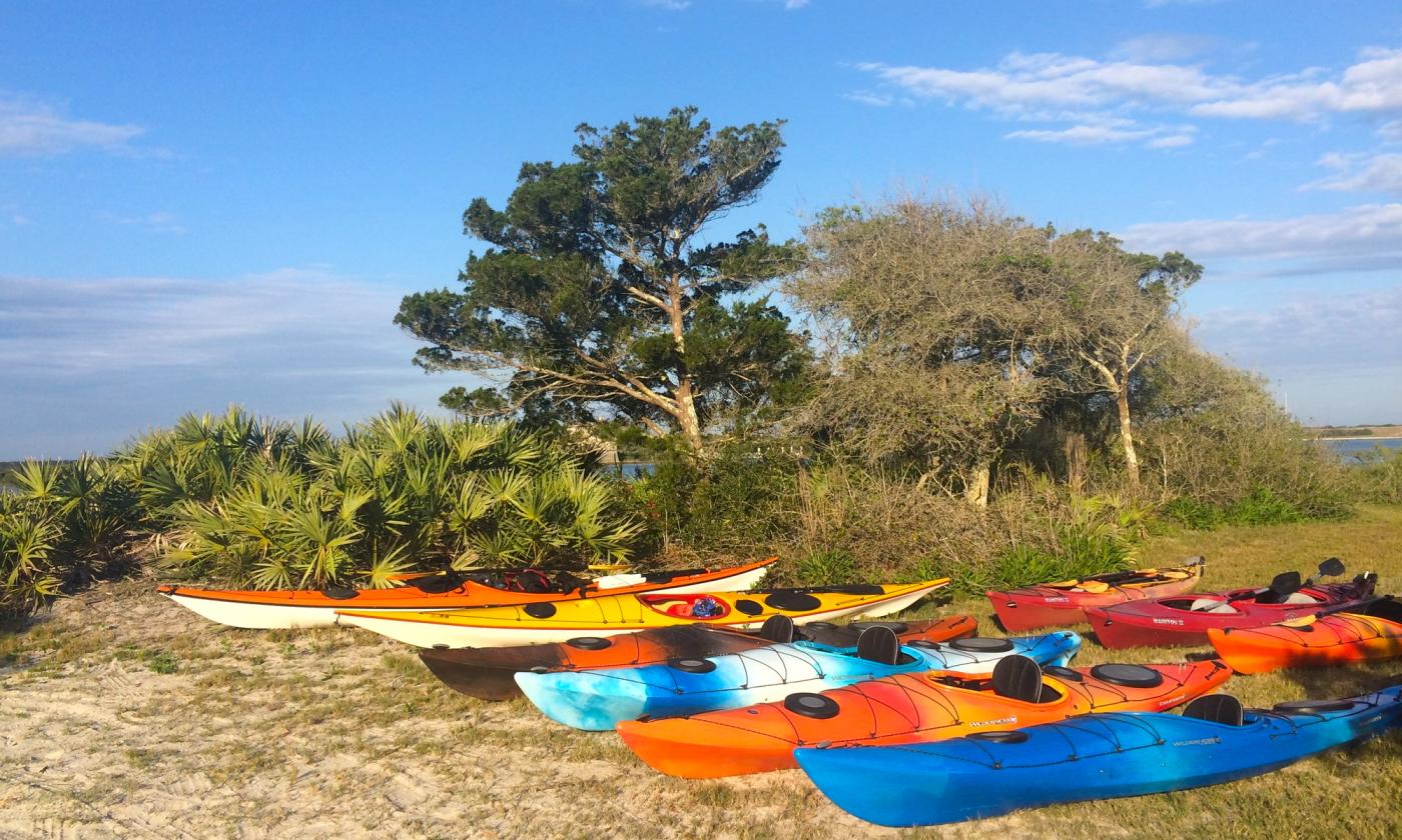 Kayaks await visitors about to enjoy an Earth Kinship water tourin St. Augustine. 