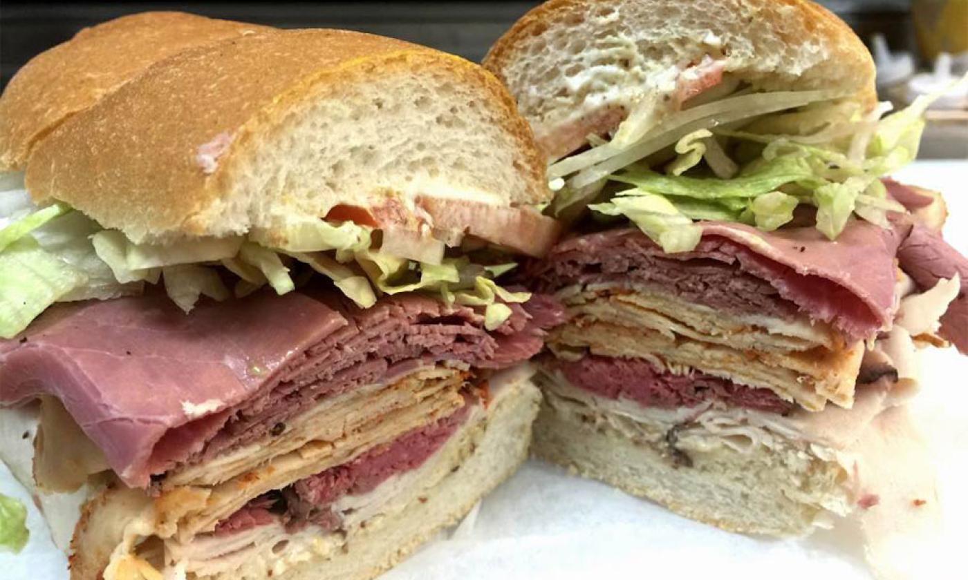 The corned beef is piled high on this freshly made sandwich from the Dilly-Dally Deli