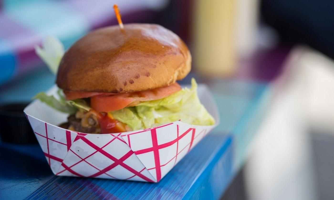 A burger ready for a food-truck customer, like food that can be found at Taste of Jacksonville in St. Augustine.