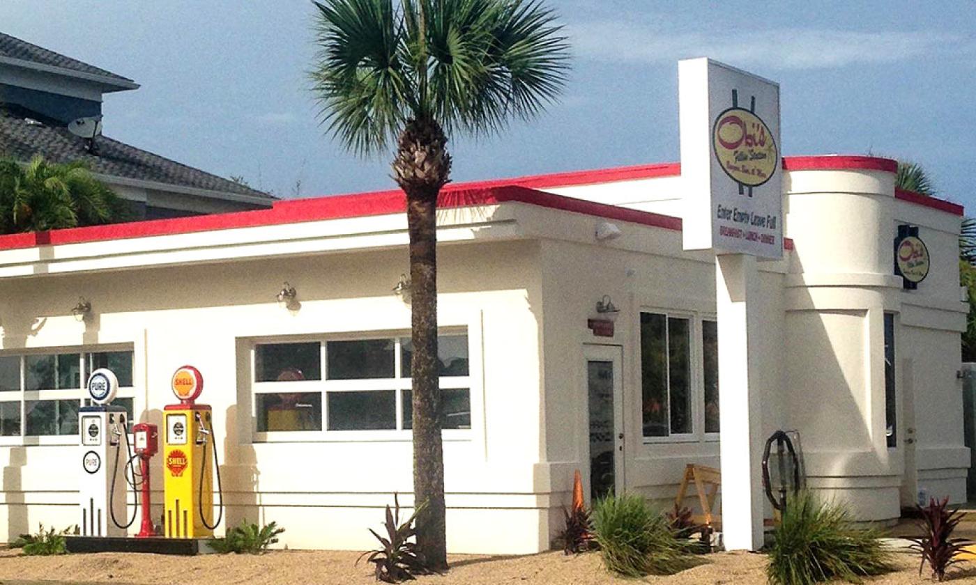 Obi's Fillin' Station is a vintage-car-themed beachside restaurant that serves burgers, beer and more.