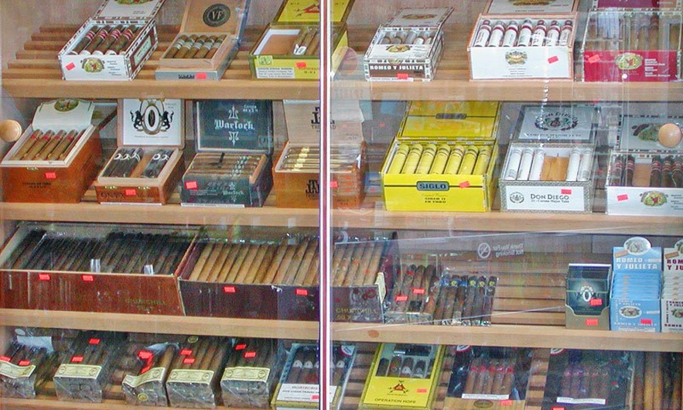 Cigars arranged along the wall for purchase 