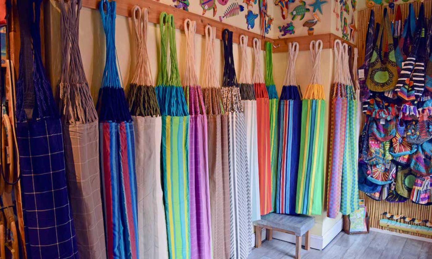 Colorful hammocks hanging along the wall