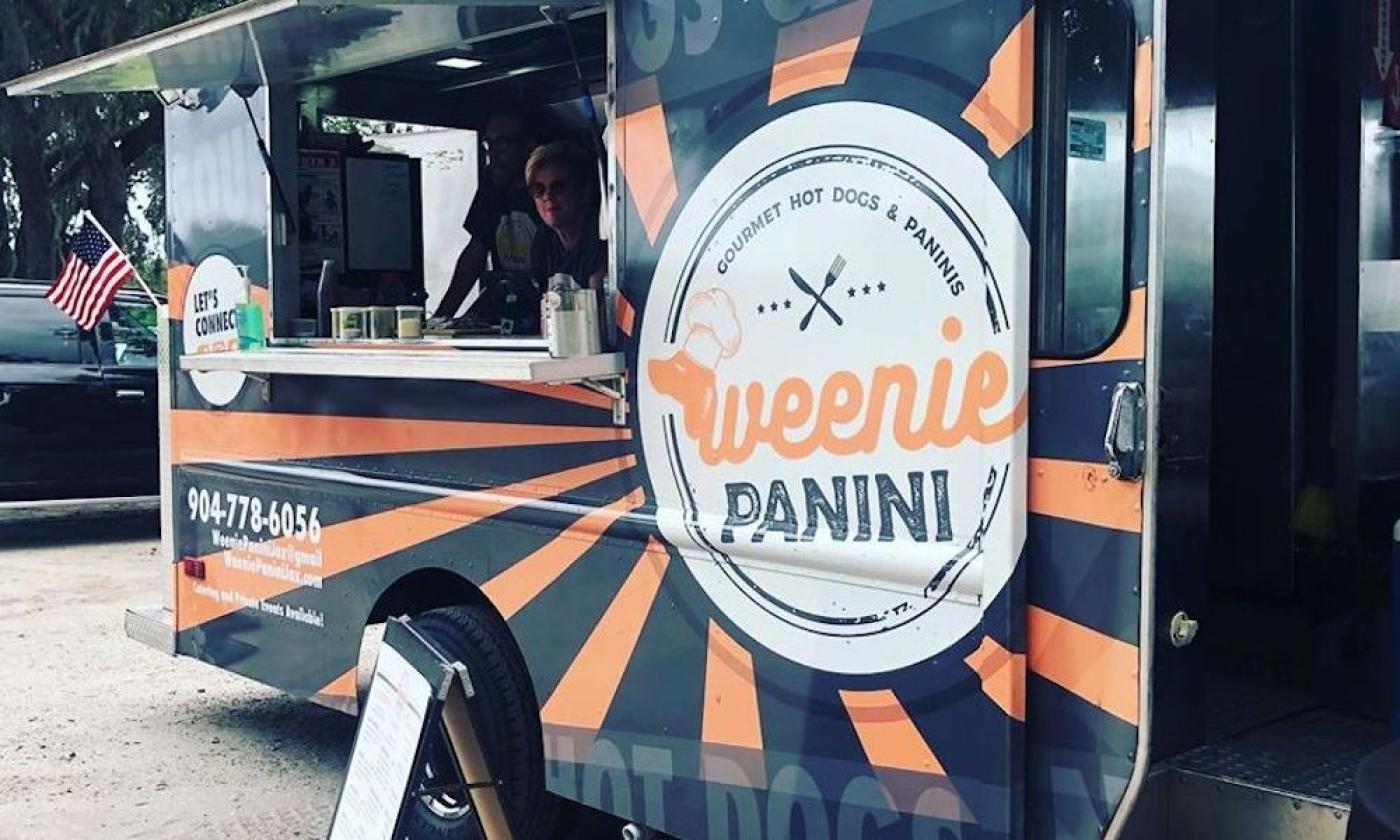 The Weenie Panini food truck parked at the Marina Munch
