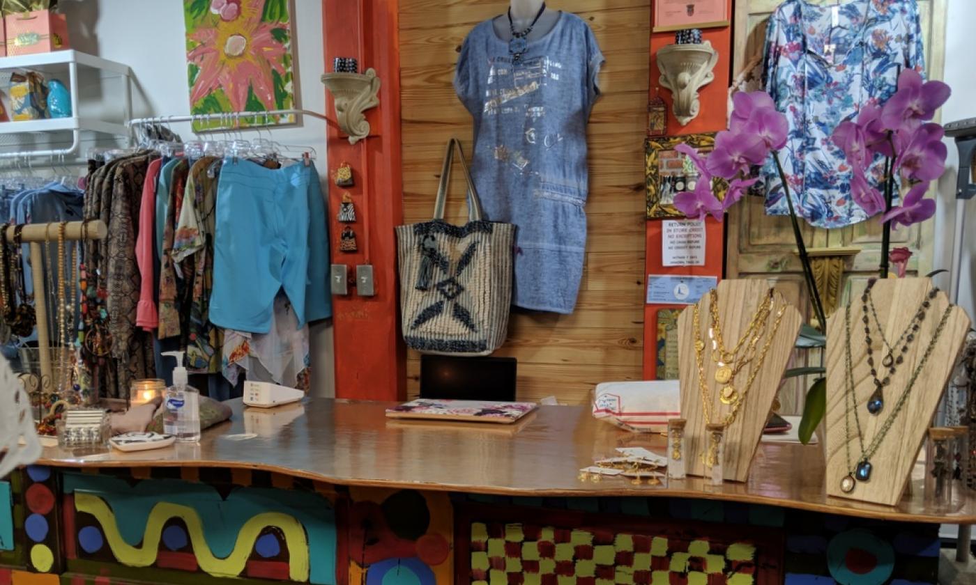 Displays of clothing and accessories at the counter at Wild Heart Boutique in St. Augustine.