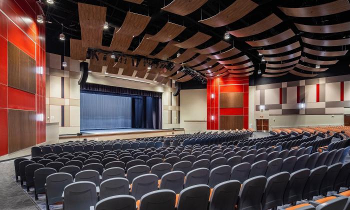 The 800 seat auditorium at Tacoi Creek High School, with 800 seats, and sound panels