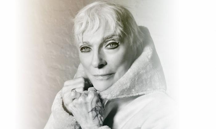 Judy Collins poses in sketched photo. 
