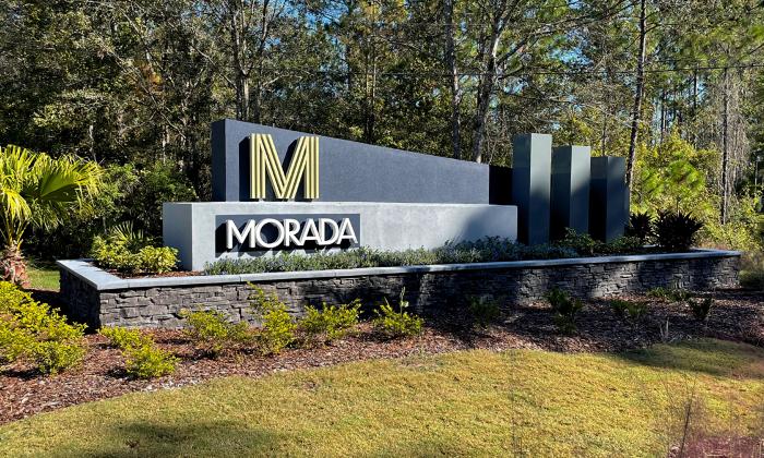 The entrance sign into the Morada residence