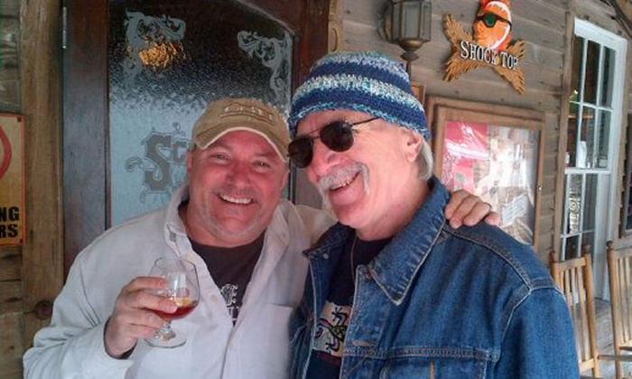 musicians John Winters and Mark Rickey enjoying a toddy