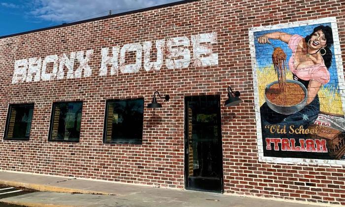 The brick exterior of Bronx House Pizza