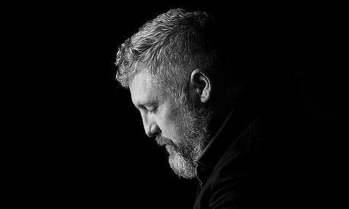 keyboardist Christopher Shawn, shown in profile