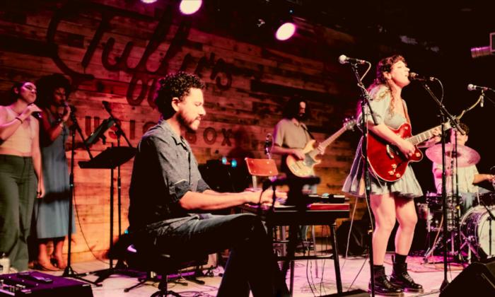 Hannah Stokes and her band onstage playing