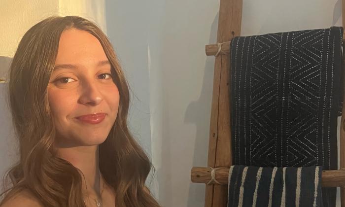 Éowyn Sage Rubino posing in a soft light