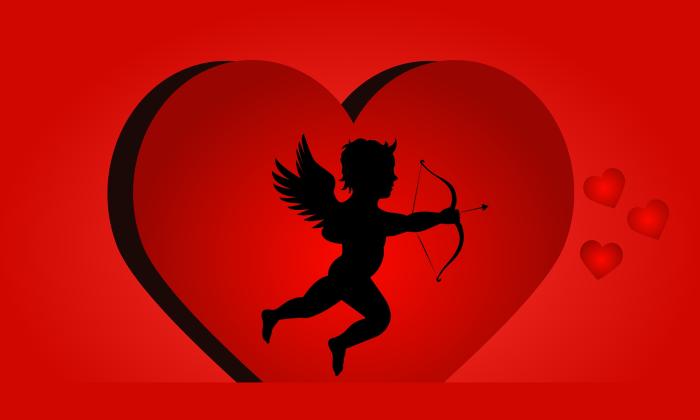 A cupid shooting an arrow, surrounded by a heart.