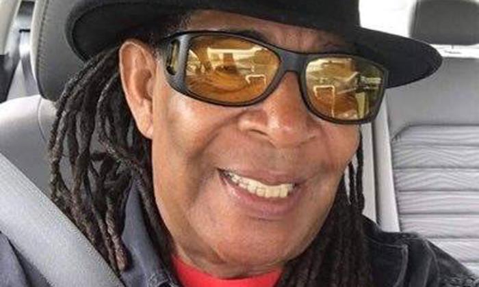 Blues artist Gitlo Lee in sunglasses, smiling