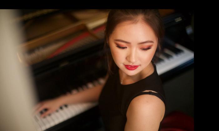 Pianist Chelsea Wang at a keyboard, viewed from above