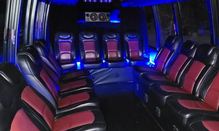 The inside of the shuttle bus with ample seating