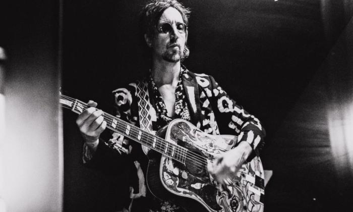 Joseph Arthur performs with his guitar.