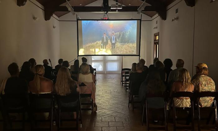 People watching a short film at the festival