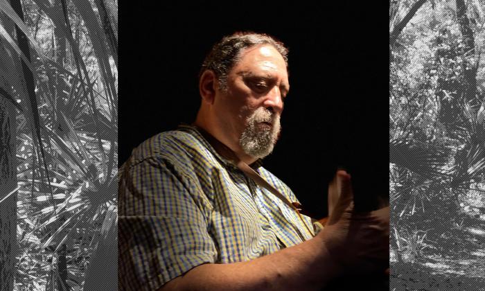 Michael Elias playing his mandolin