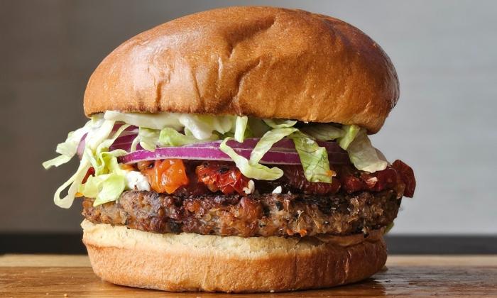 A burger with an assortment of toppings