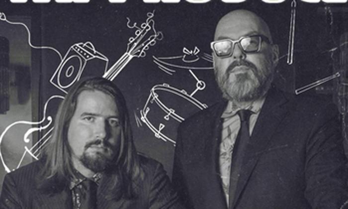Jazz sould duo Fat Produce standing together on stage. 