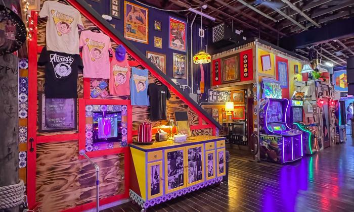 Merchandise and arcade games lining the walls