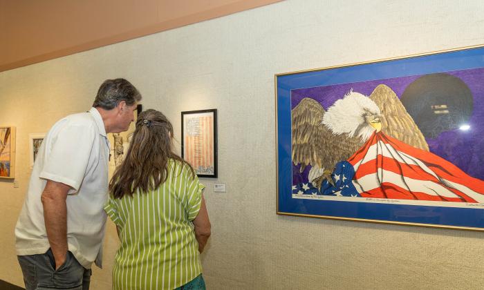 Visitors looking around the exhibit