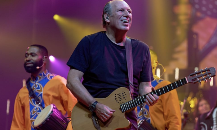 Hans Zimmer and Friends perform live on stage.