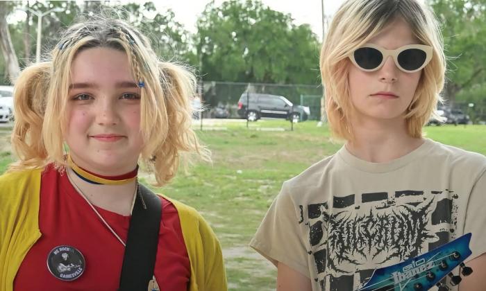The duo Youth Ambulance standing outside at a music event