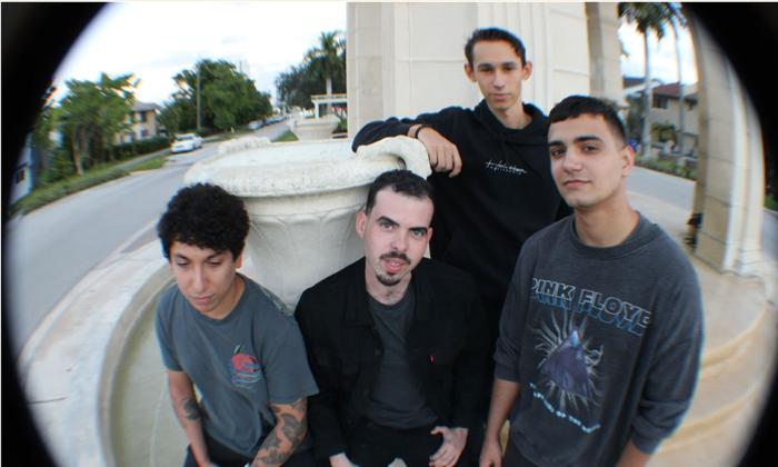 the band Responder reflected in a fisheye lens