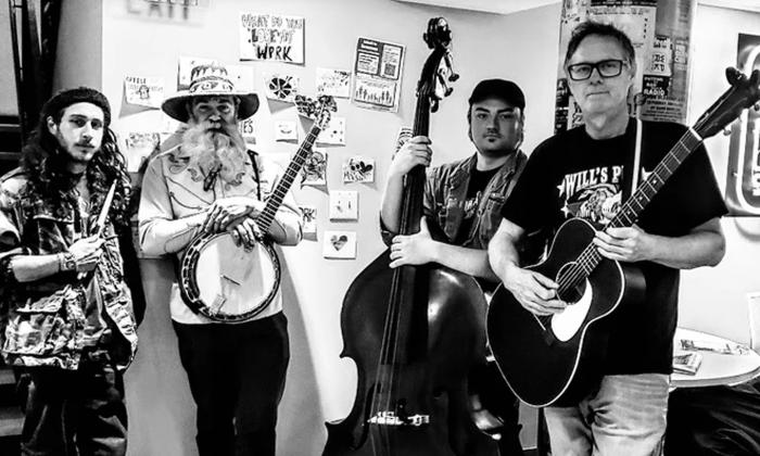 Tom Haney Band, holding instruments